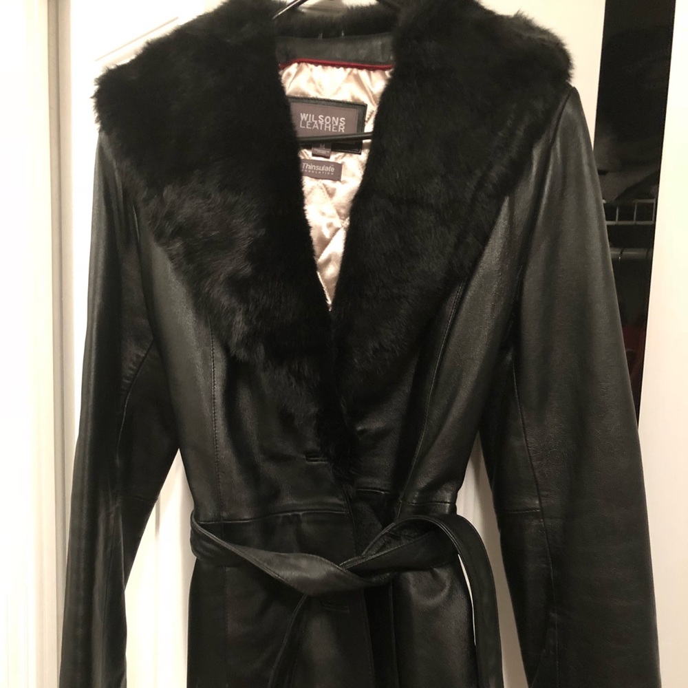 Women’s belted leather jacked with fur trim.